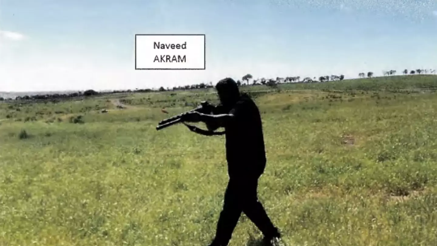 Suspected shooter Naveed Akram allegedly grips a gun during 'firearm training' in the countryside (New South Wales Police/New South Wales Local Court)