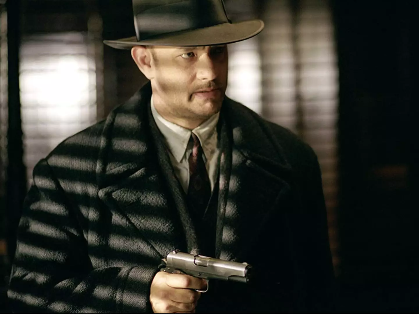 Tom Hanks played the role of a hitman.