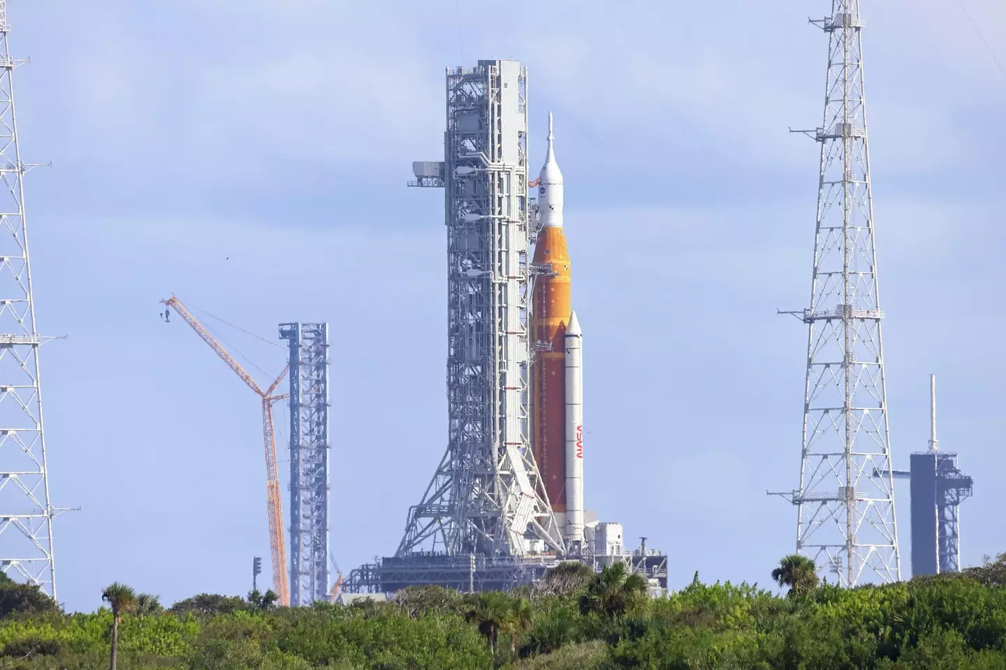 NASA’s brand new, yet-to-fly, Space Launch System (SLS) rocket, pictured, will fly to the Moon this week..