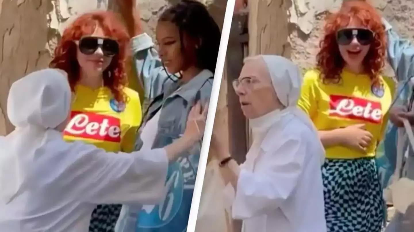 Moment nun pulls two girls apart kissing during shoot in Naples