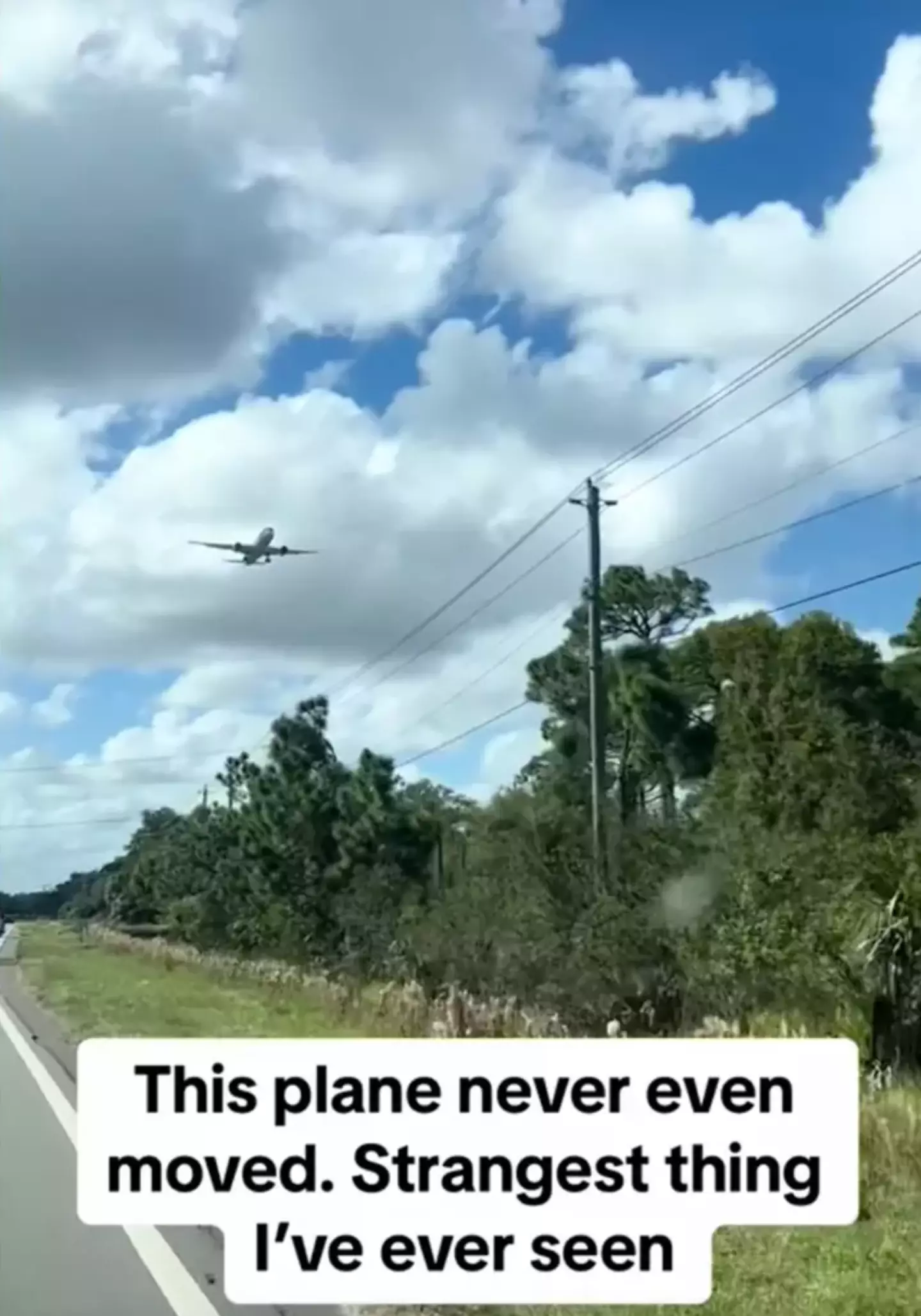 The plane appears frozen in the air.