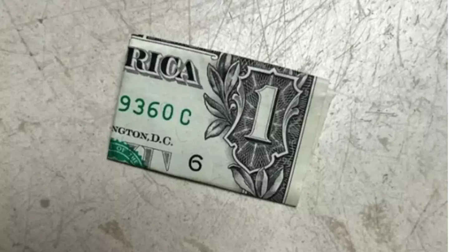 People Are Being Warned Not To Pick Up Folded Dollar Bills