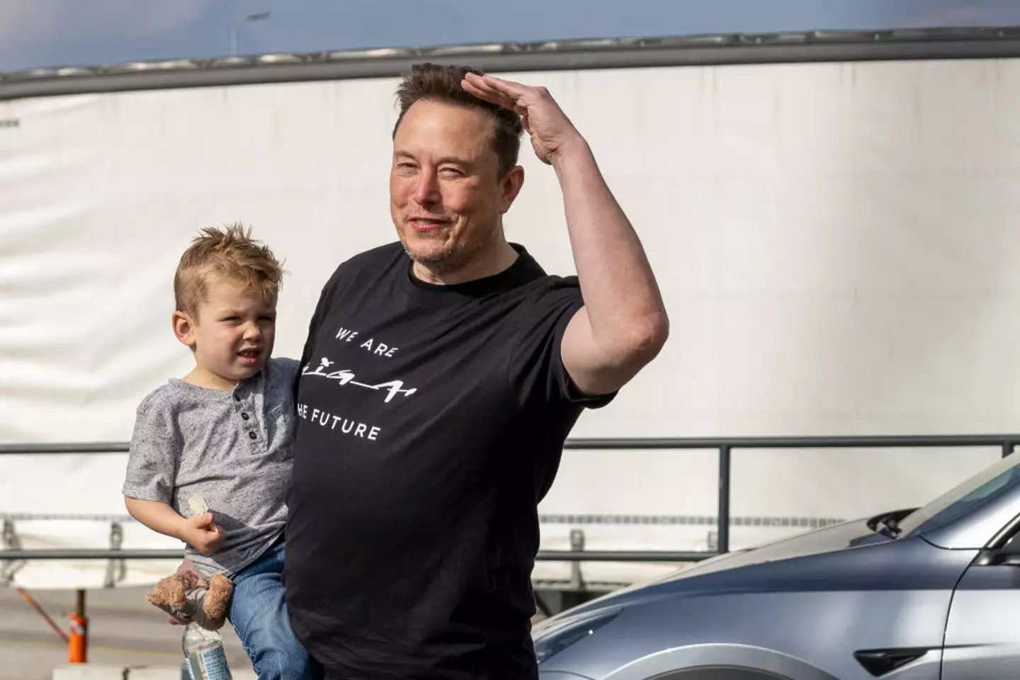 Musk with his and Grimes' eldest son, X Æ A-Xii (Maja Hitij/Getty Images)