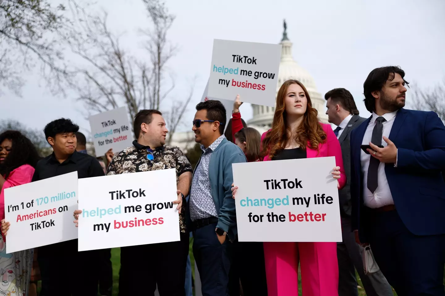 People protest the bill outside the Capitol Building.