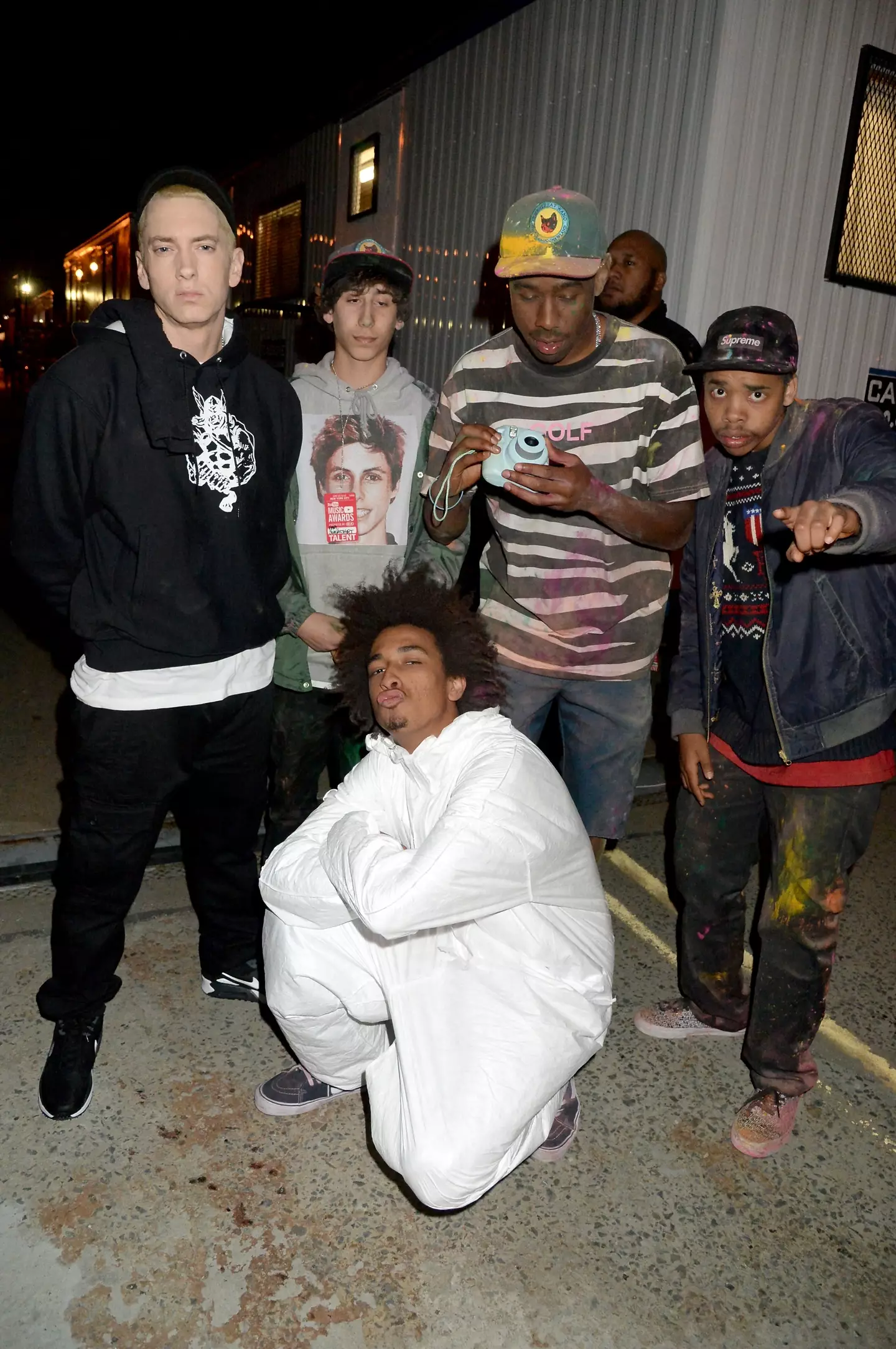 Eminem and Tyler, The Creator with other members of Odd Future in 2013.
