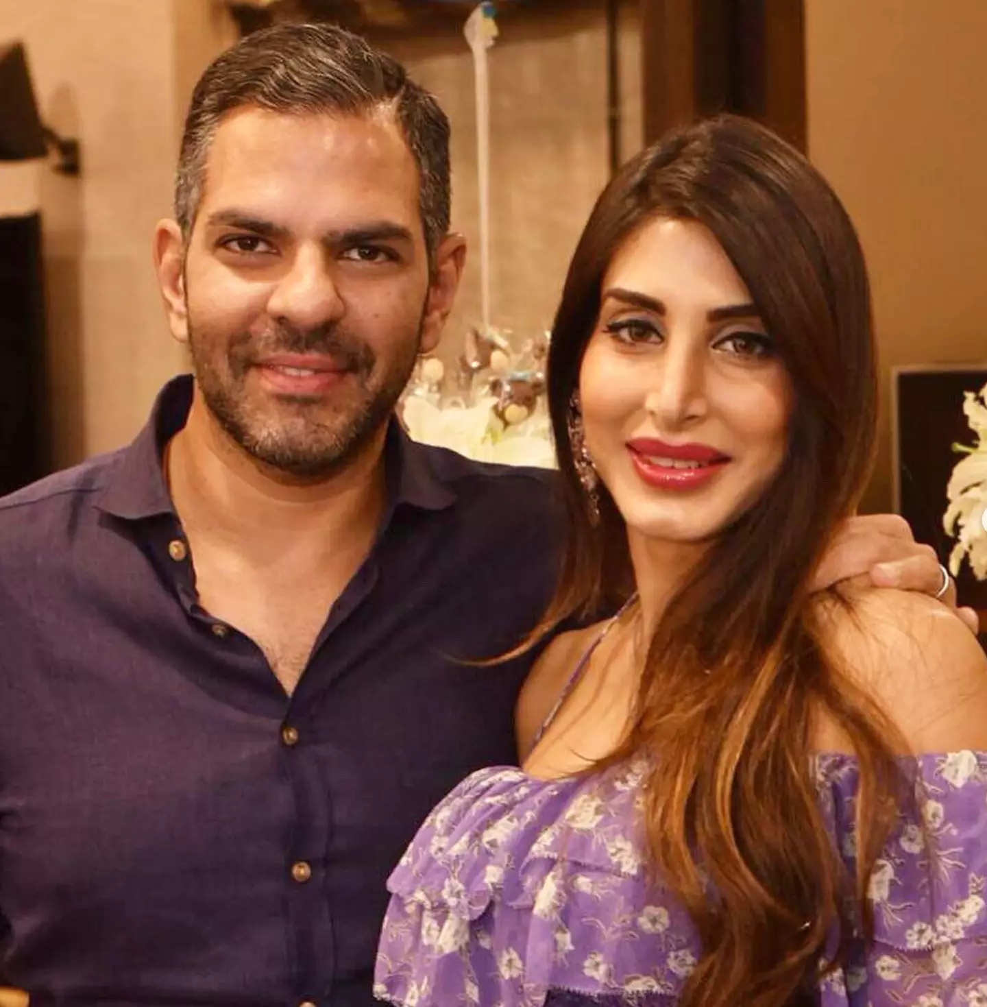 Sunjay Kapur, pictured with his wife Priya Sachdev, has died at the age of 53 (priyasachdevkapur/Instagram)