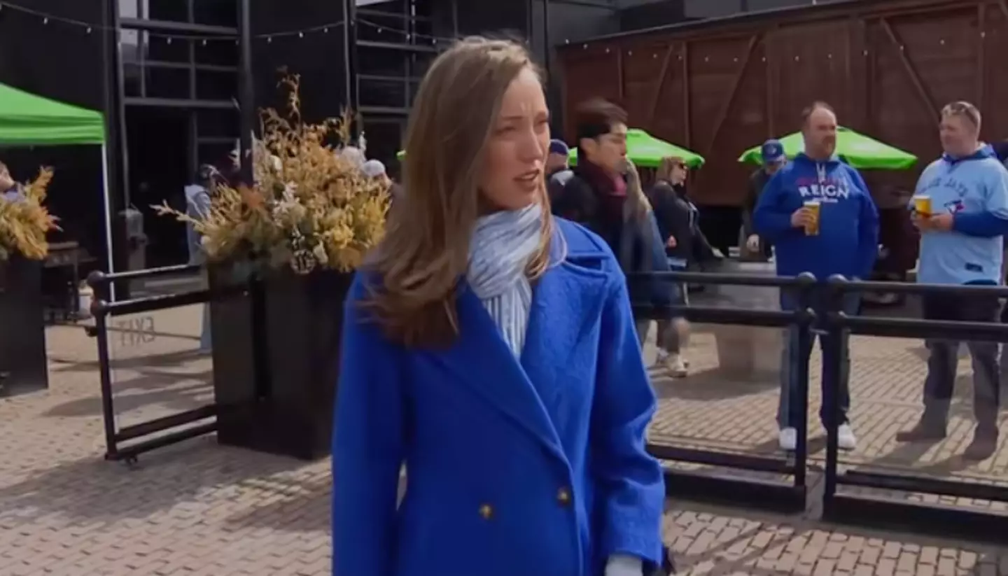 The reporter gave the man and his son a very stern look afterwards (@michellemackeytiktok/TikTok)