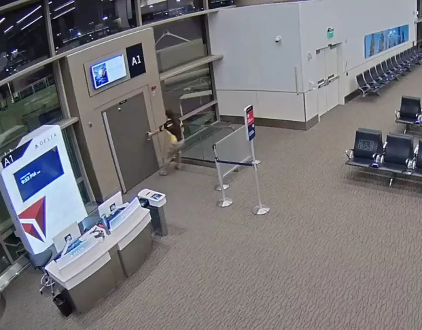 The footage shows him making his way through the airport.