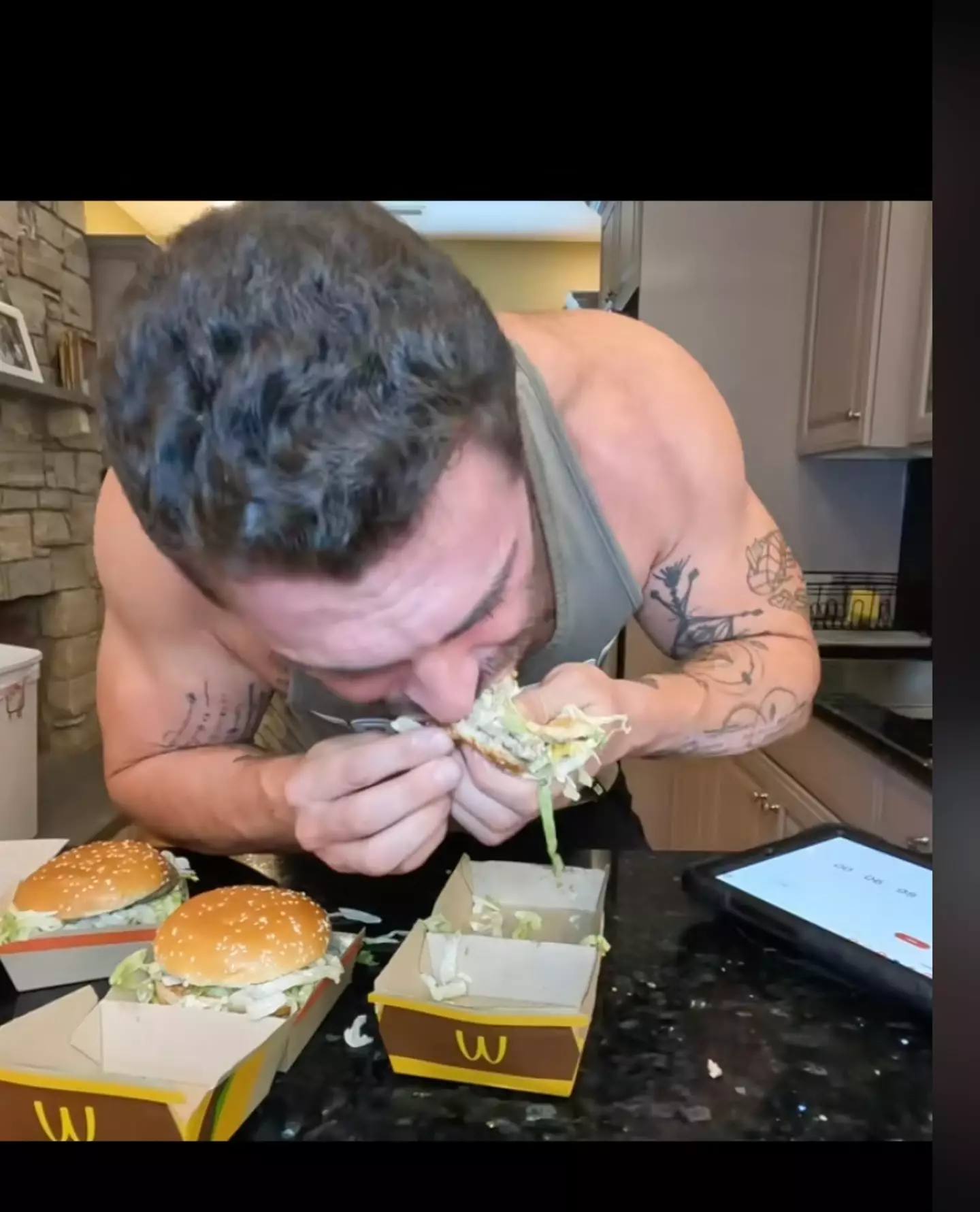 He often films himself eating fast food at speed (TikTok/@zona.eats)