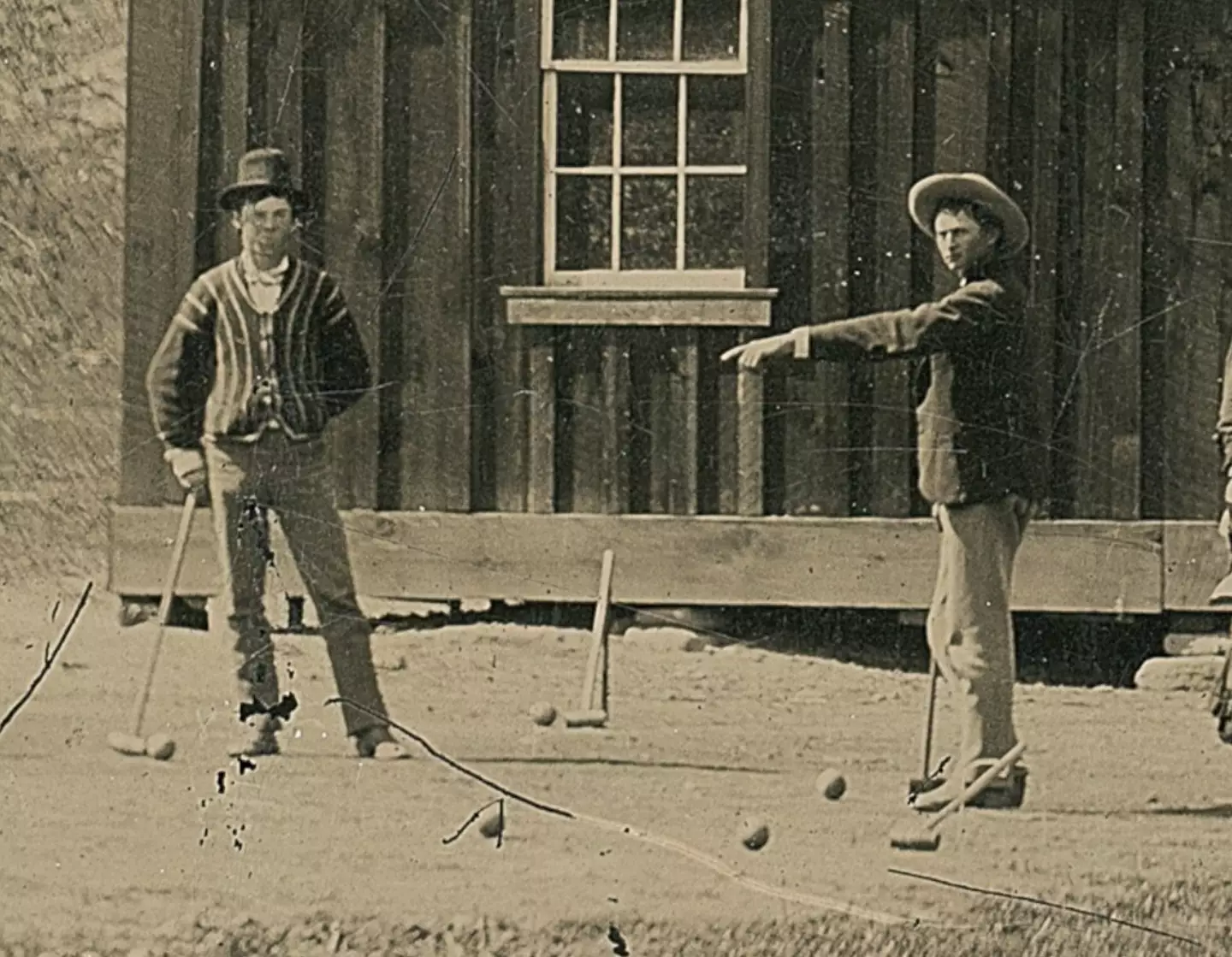 The photo shows Billy the Kid on the left.
