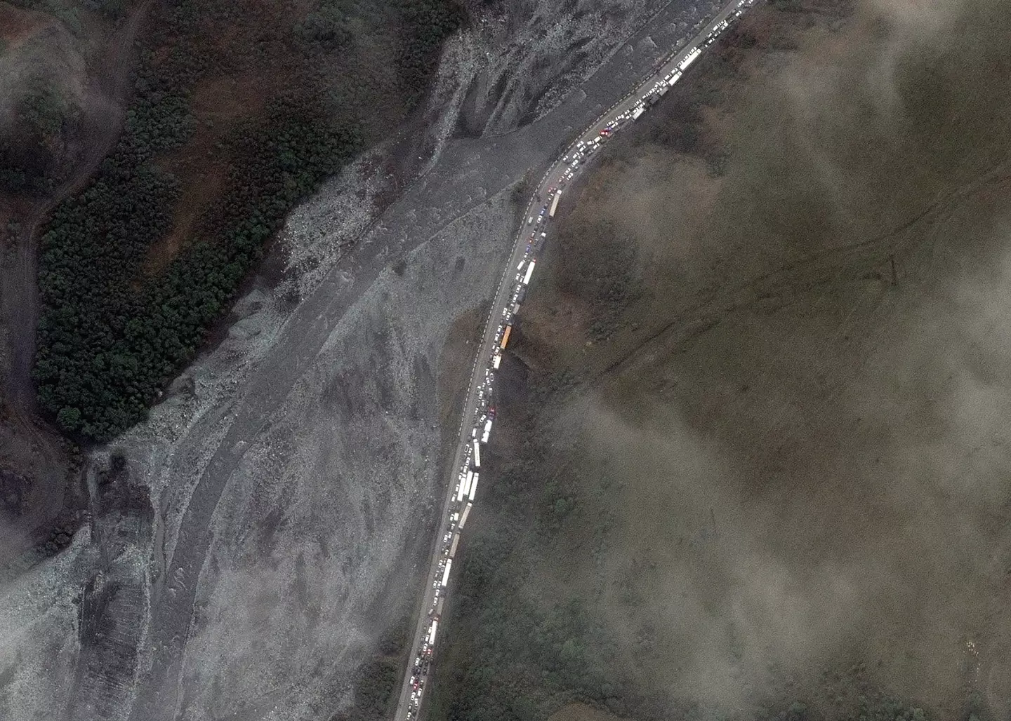 The queues stretch for miles as people look to get out of Russia.