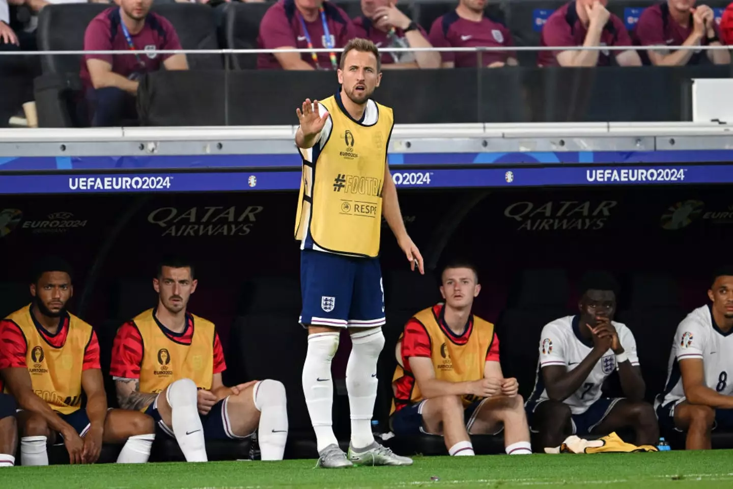 Harry Kane watched from the sidelines during the closing stages of England's 1-1 draw with Denmark (