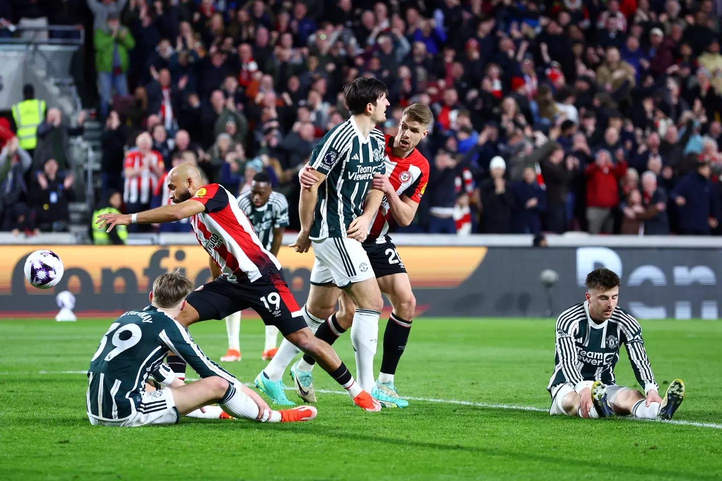 Mason Mount and Scott McTominay look dejected after Kristoffer Ajer scores. Image: Getty