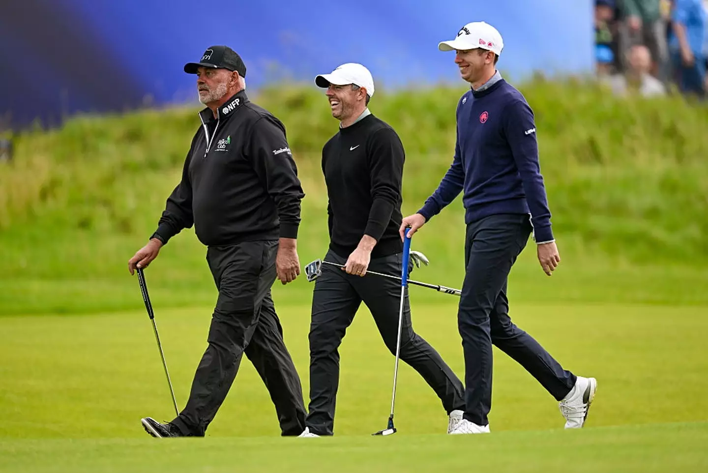 McIlroy and McKibbin reunited in July as they played a practice round with fellow Northern Irishman Darren Clarke ahead of the British Open in Portrush. (Image: Ramsey Cardy/Sportsfile via Getty Images)