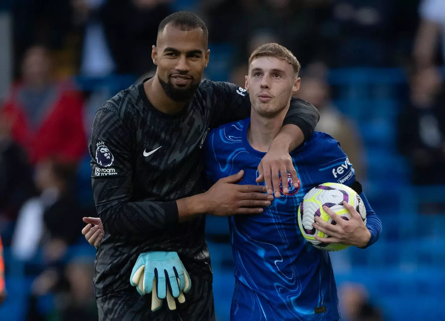 Robert Sanchez celebrated with Cole Palmer after Chelsea's 4-2 win over Brighton. (Image: Getty)
