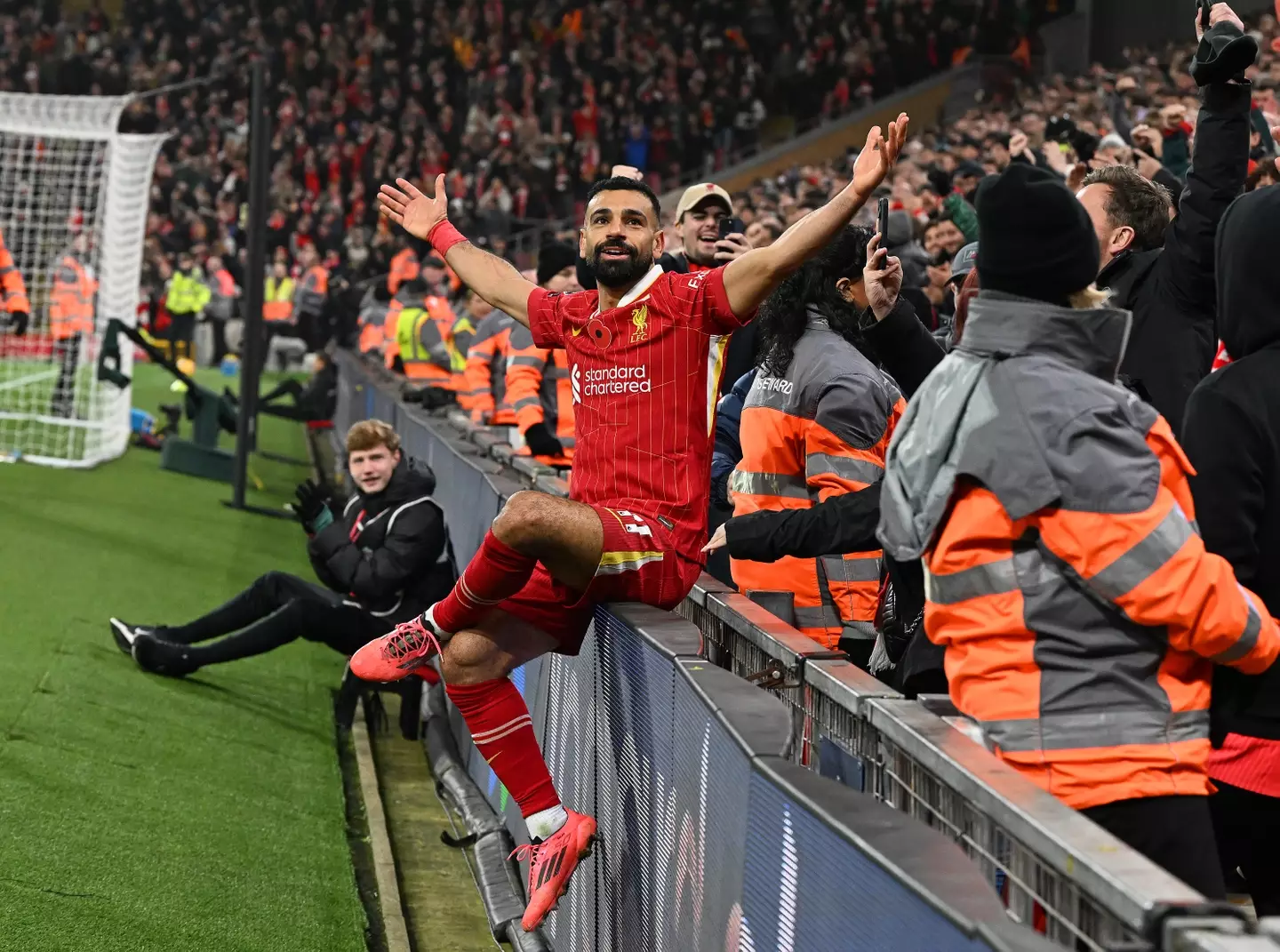 Mohamed Salah celebrates scoring a goal against Aston Villa. (Image: Getty)
