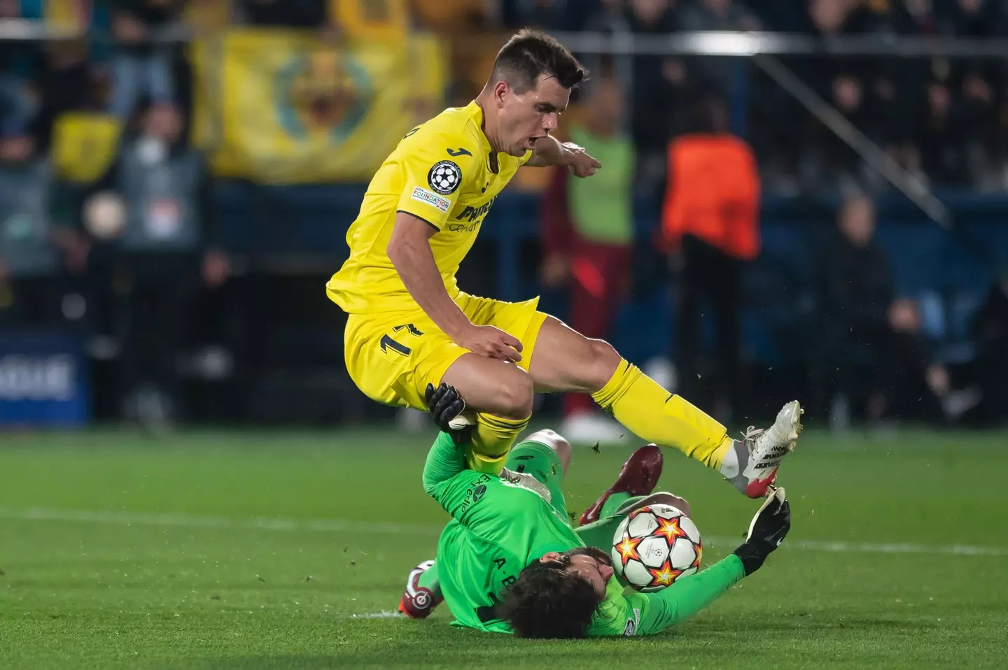 Did Alisson take out Lo Celso? Image: PA Images