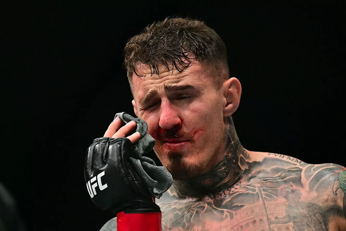 Tom Aspinall couldn't continue following the eye poke. (Image: GIUSEPPE CACACE/AFP via Getty Images)