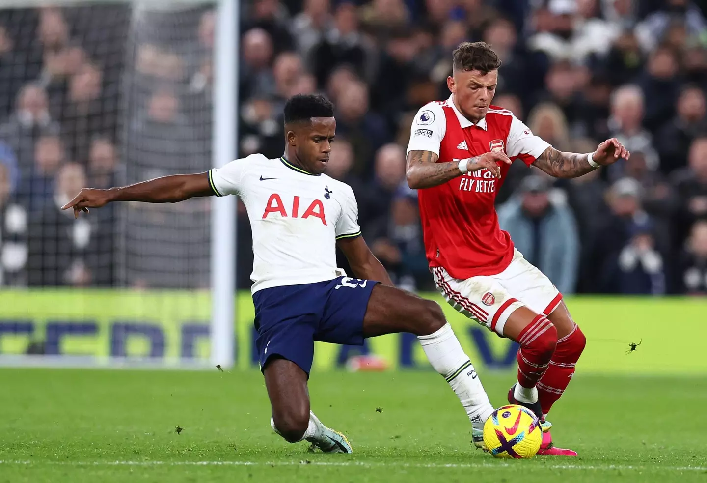 White battles Sessegnon for the ball. (Image