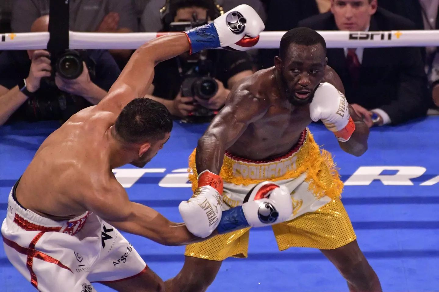 Khan has been training alongside his former opponent Terence Crawford (Image: PA)