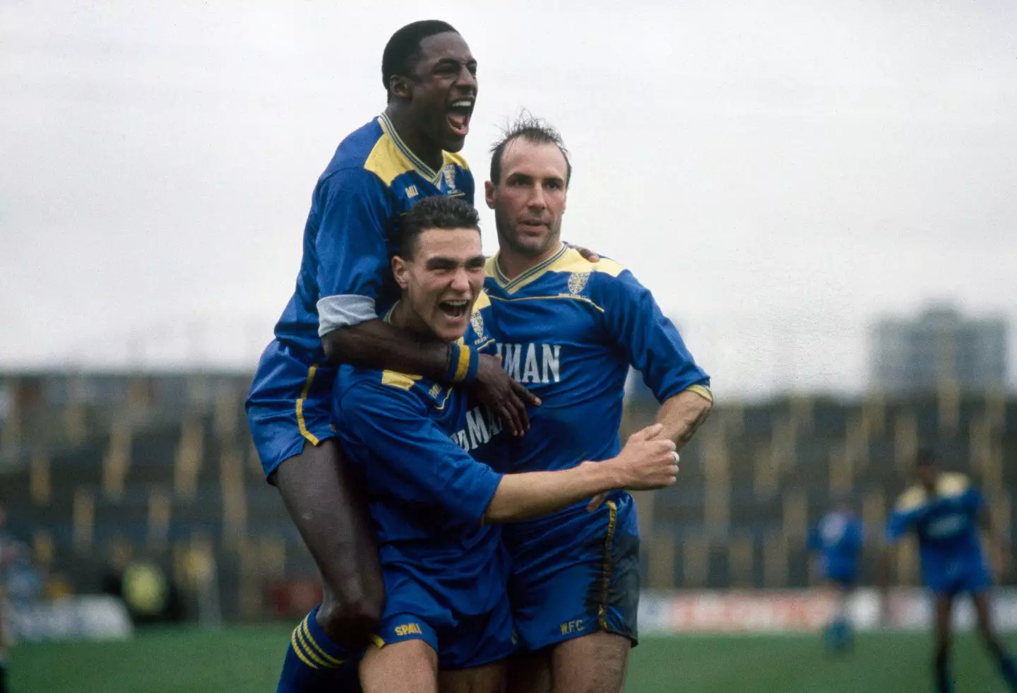 John Fashanu, Vinnie Jones and Alan Cork celebrate a Wimbledon goal. Image: Getty