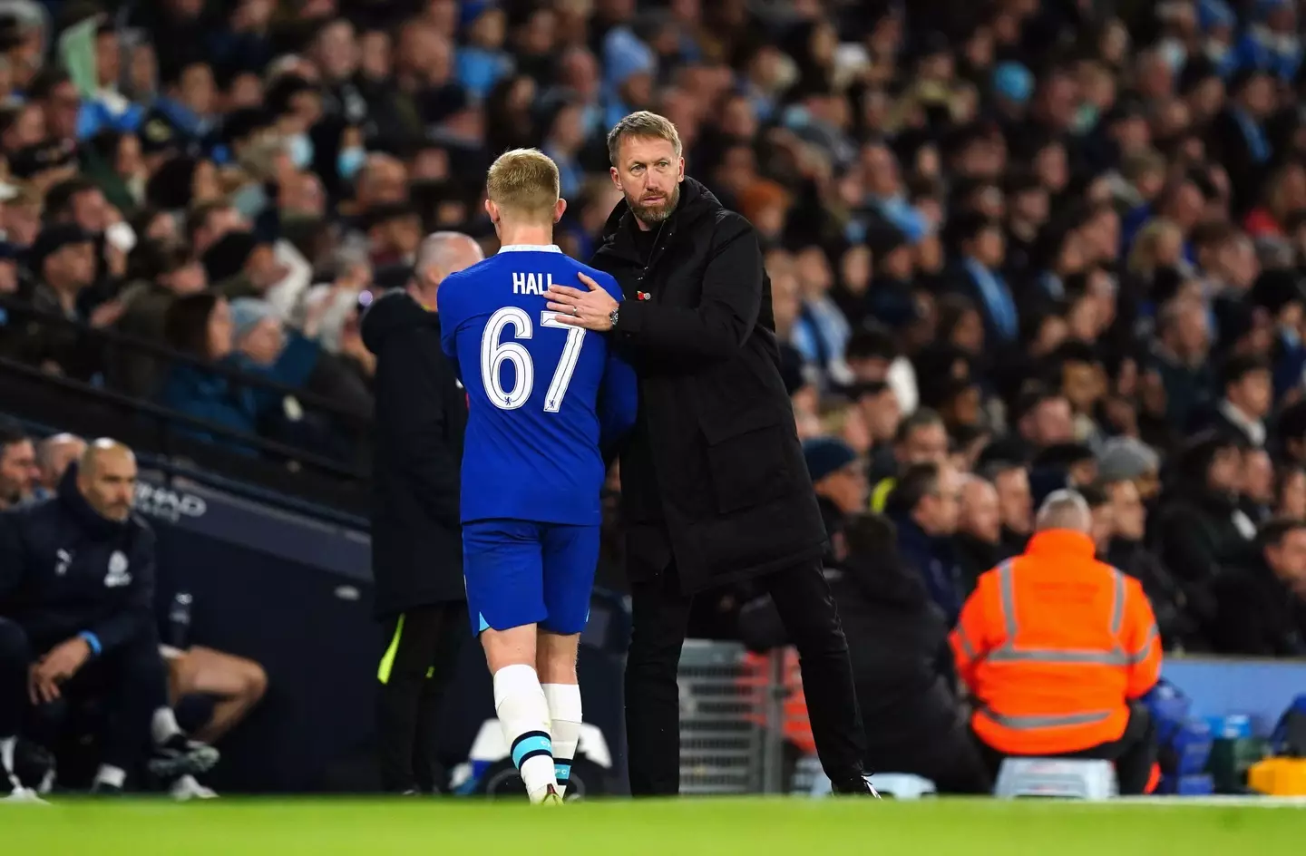 Chelsea's Lewis Hall greets manager Graham Potter after being substituted off during the Carabao Cup third round match at the Etihad Stadium. (Alamy)