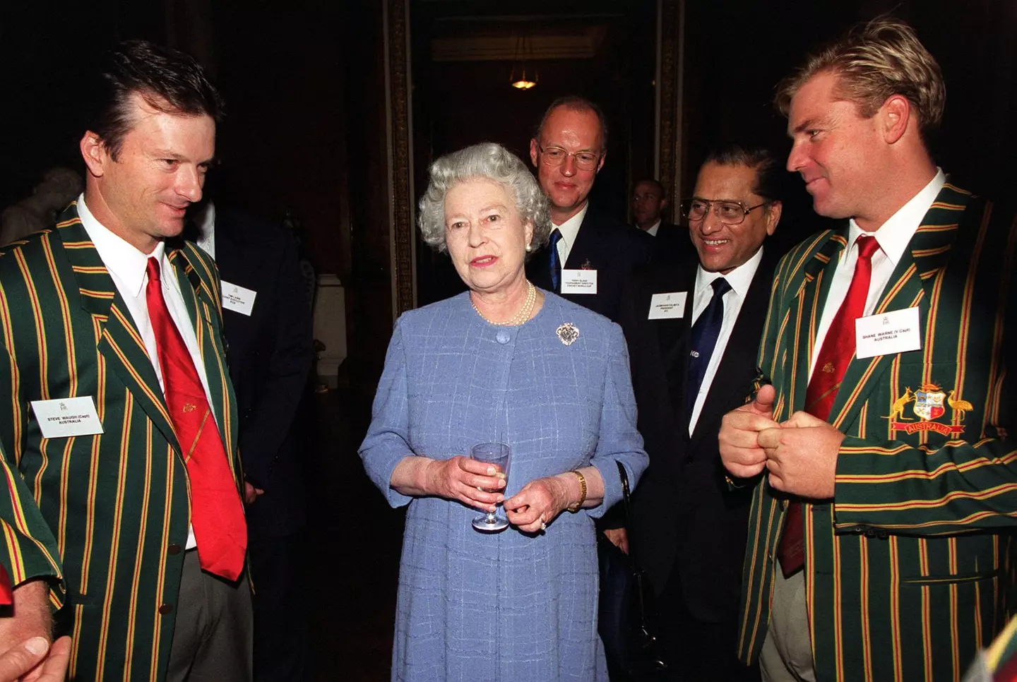 The Queen with Australian cricketers Steve Waugh and Shane Warne.