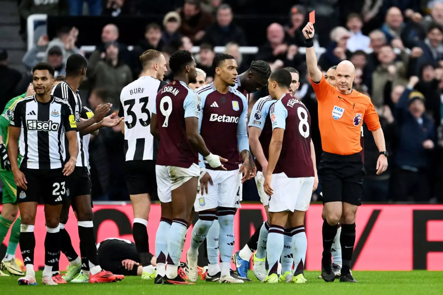 Jhon Duran was sent off by referee Anthony Taylor in the first half against Newcastle (Image: Getty)