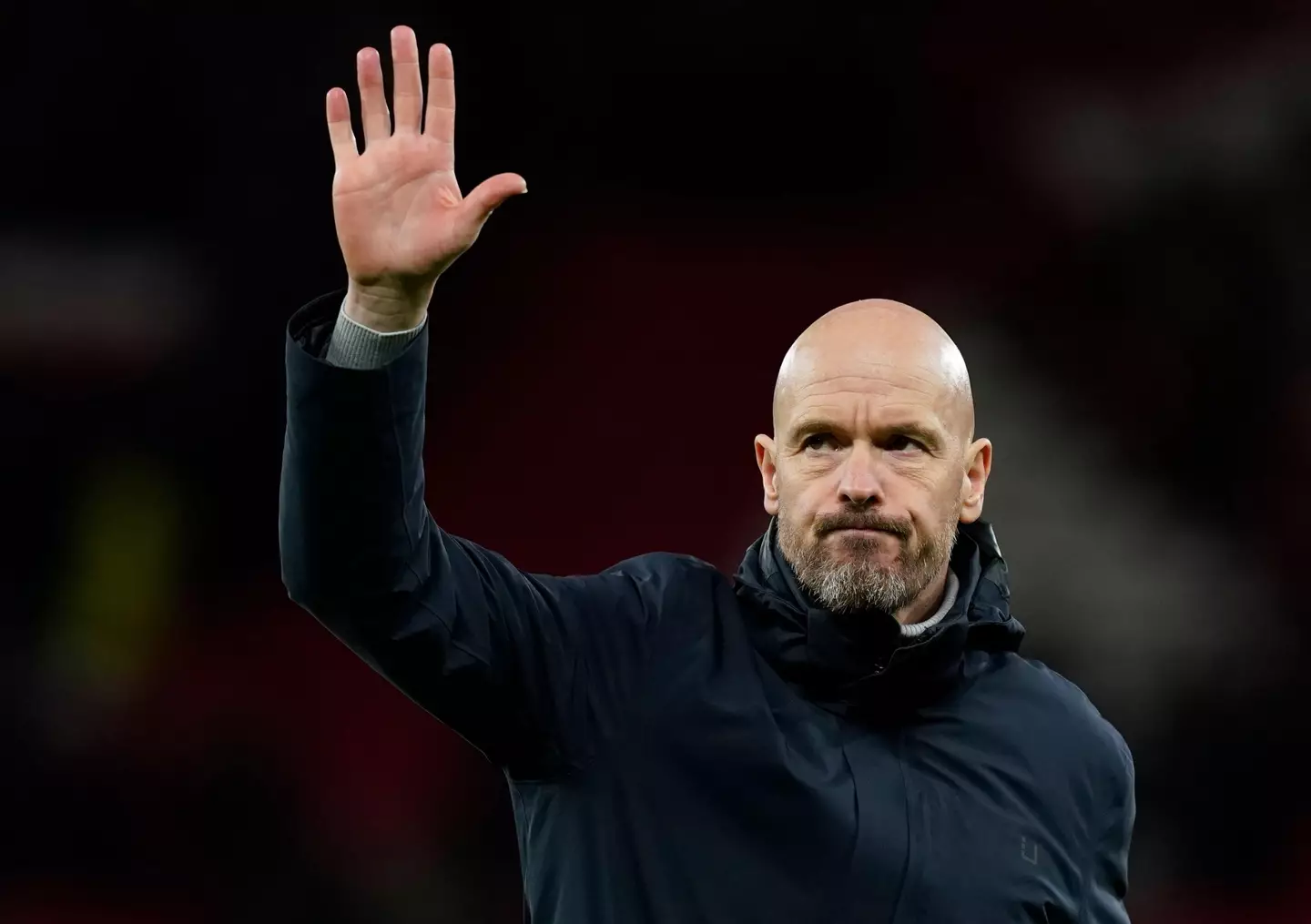 Erik ten Hag gestures to the Old Trafford crowd after Man United's draw against Sevilla. Image: Alamy 