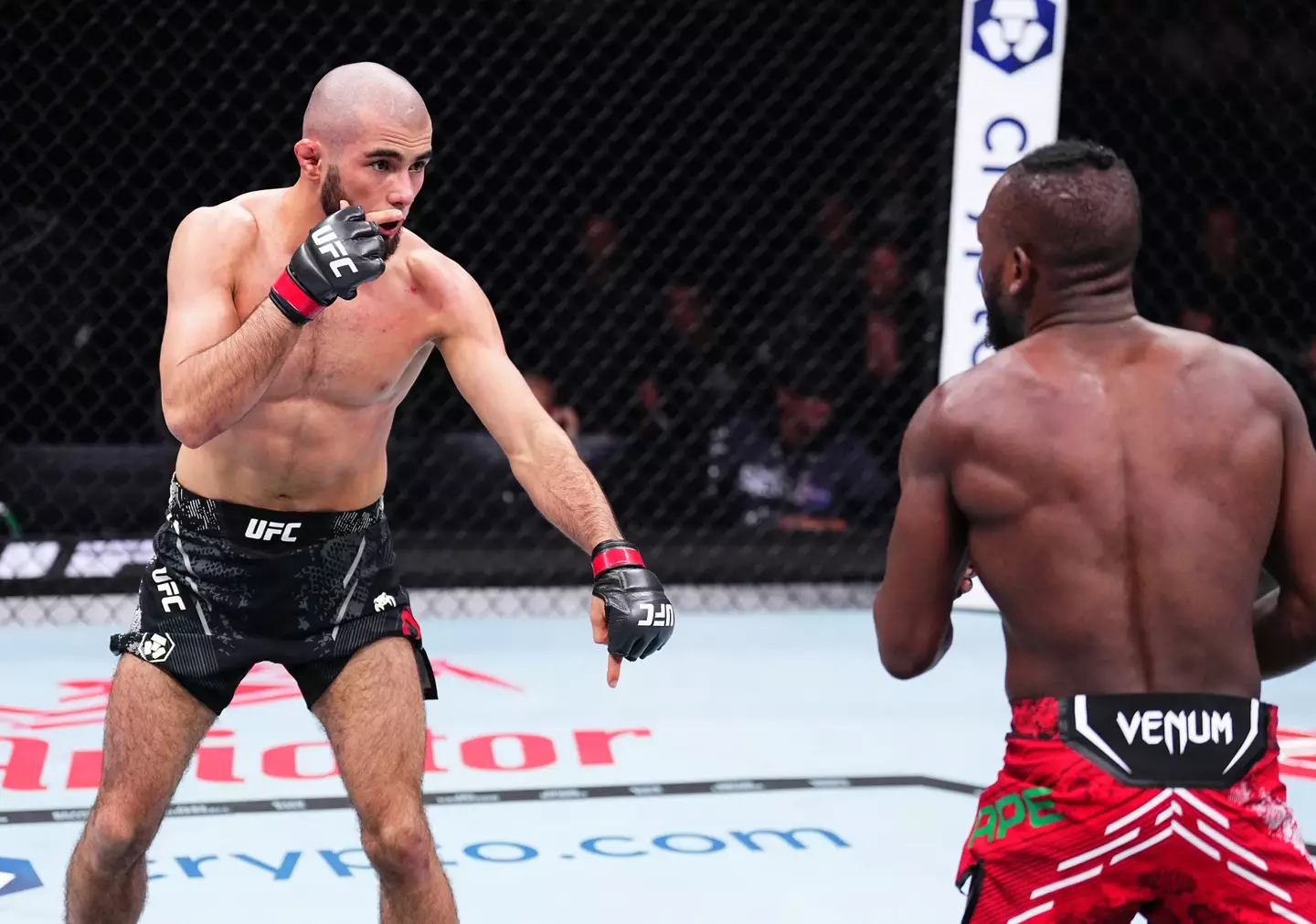 Muhammad Mokaev and Manel Kape during their flyweight bout at UFC 304. Image: Getty
