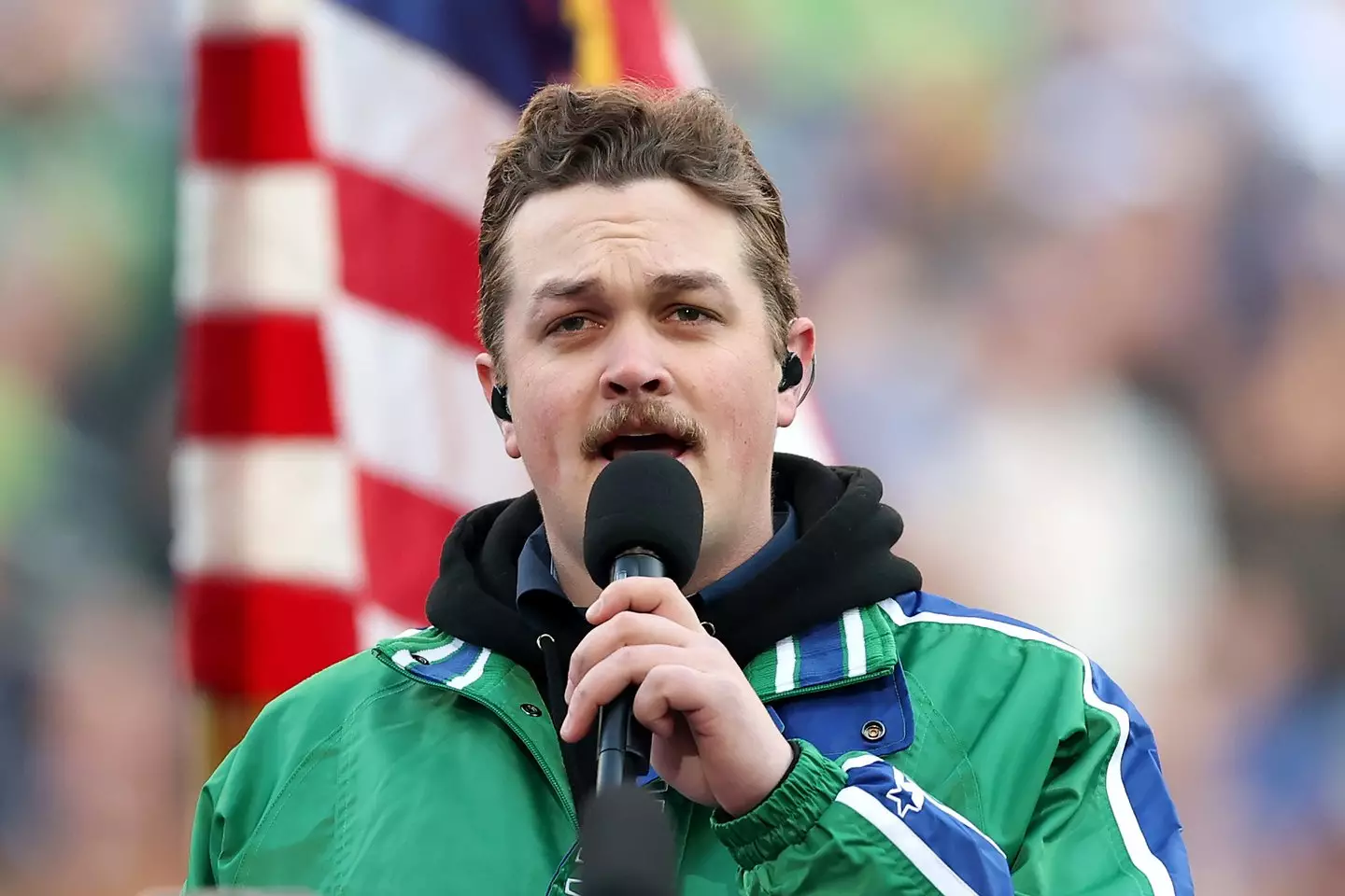 Zach Top sang the national anthem ahead of the game. Image: Getty
