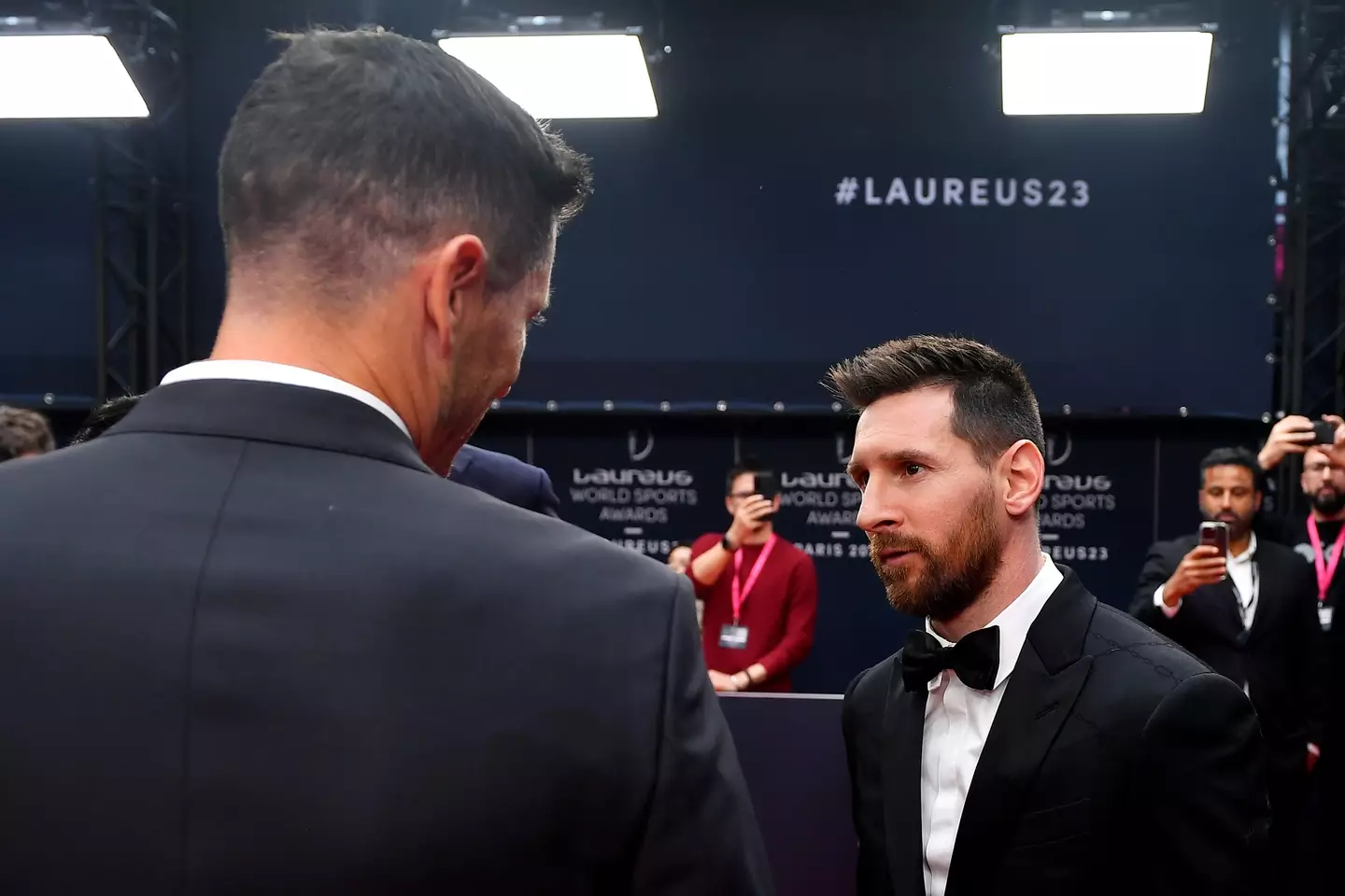 Messi and Lewandowski in conversation earlier this year. (Image