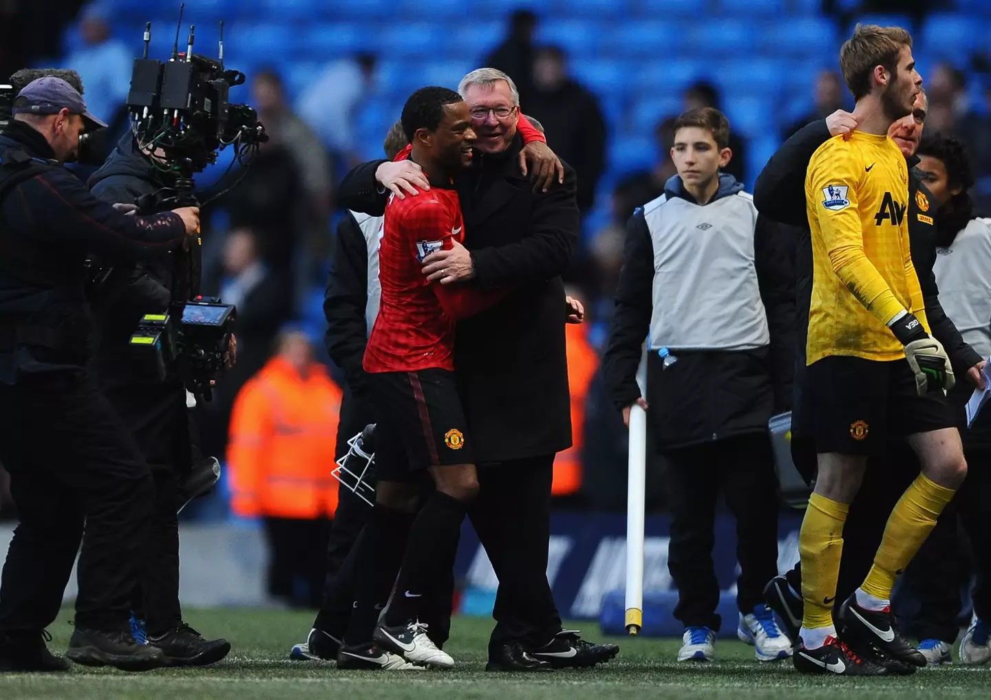 Patrice Evra and Sir Alex Ferguson share a warm embrace. Image: Getty