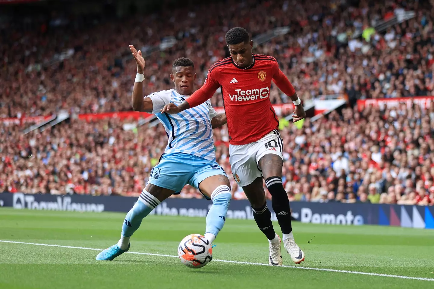 Marcus Rashford and Danilo collide. Image: Getty 