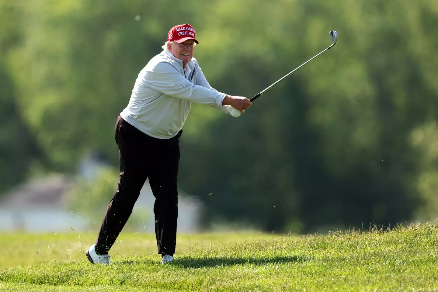 Donald Trump playing a round of golf. Image: Getty