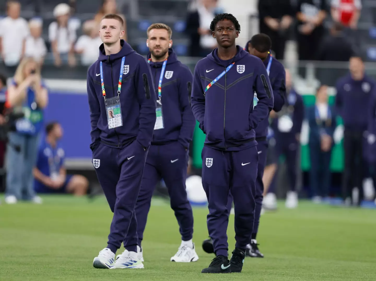 Adam Wharton (left) and Kobbie Mainoo (right) look on before England's 1-1 draw with Denmark at Euro 2024 (