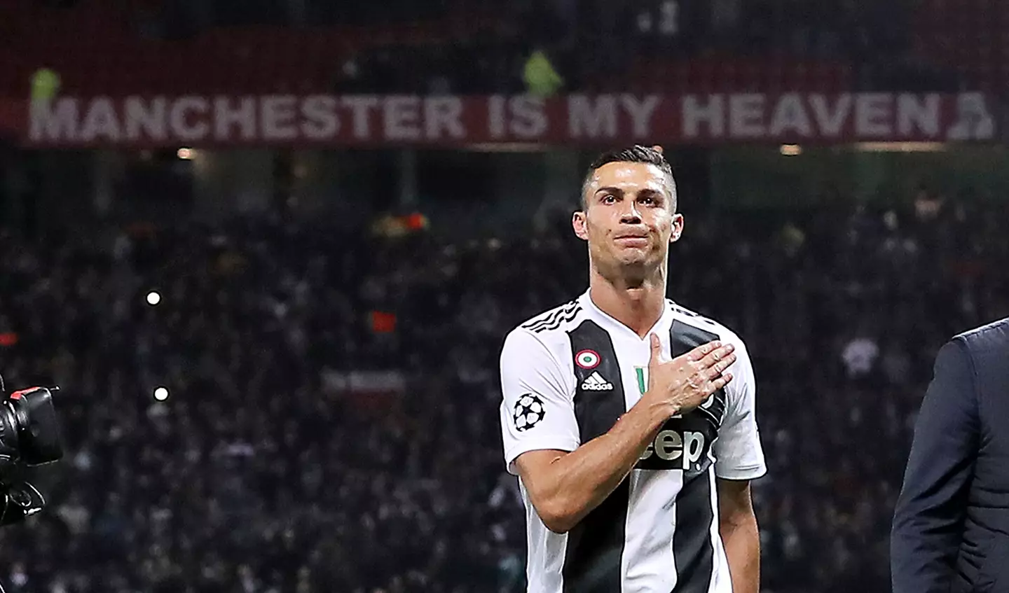 Ronaldo under the lights at Old Trafford in Juve colours.