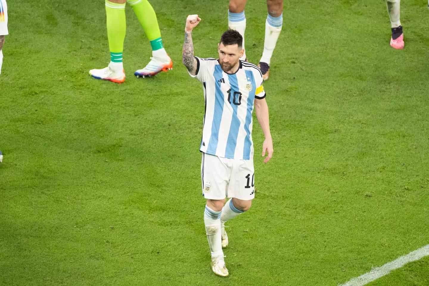 Lionel Messi celebrates on the pitch after Argentina beat Croatia. Image: Alamy