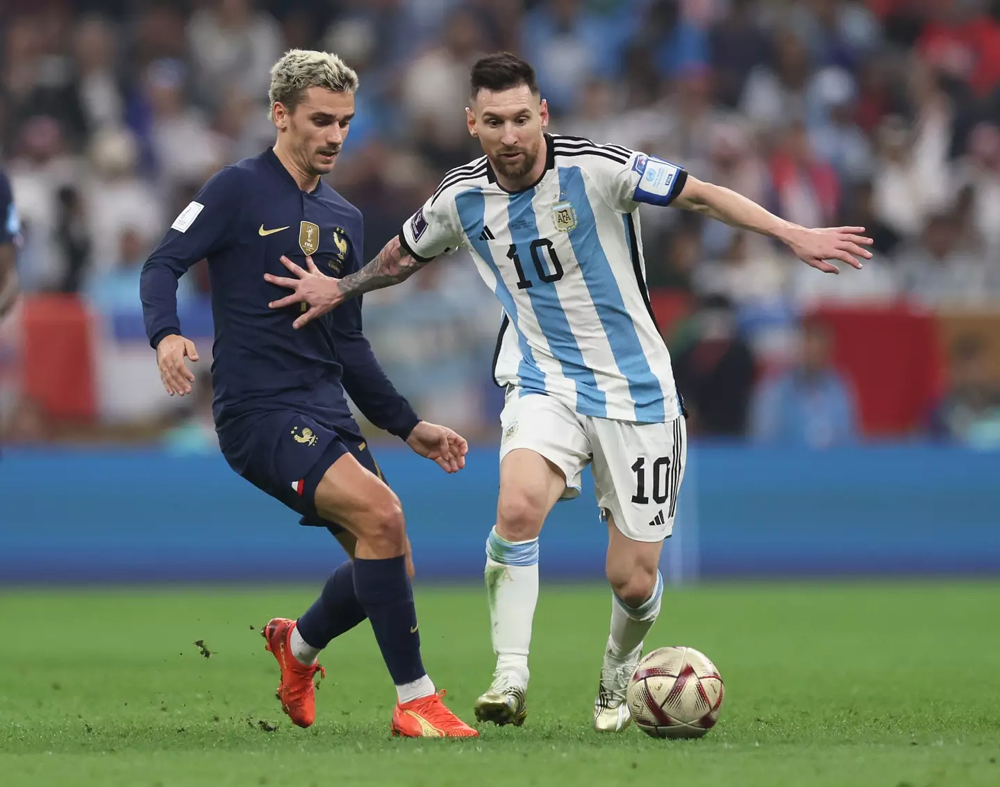 Antonie Griezmann and Lionel Messi during the World Cup final. Image: Getty