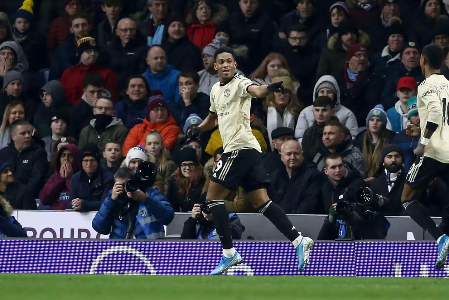 Anthony Martial celebrates with Marcus Rashford after opening the scoring against Burnley in December 2019 |