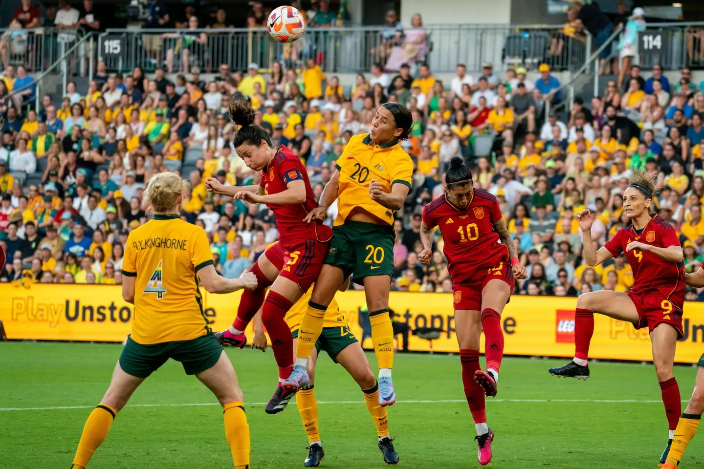 Sam Kerr of the Matildas challenging for the ball.