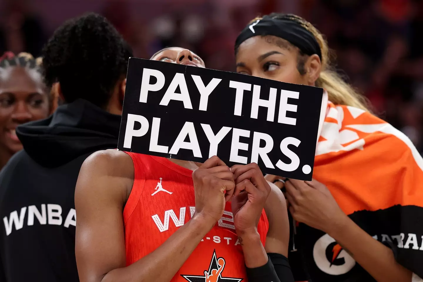 Angel Reese and Brittney Sykes are just two of the players campaigning for better pay. (Image: Steph Chambers / Staff via Getty)