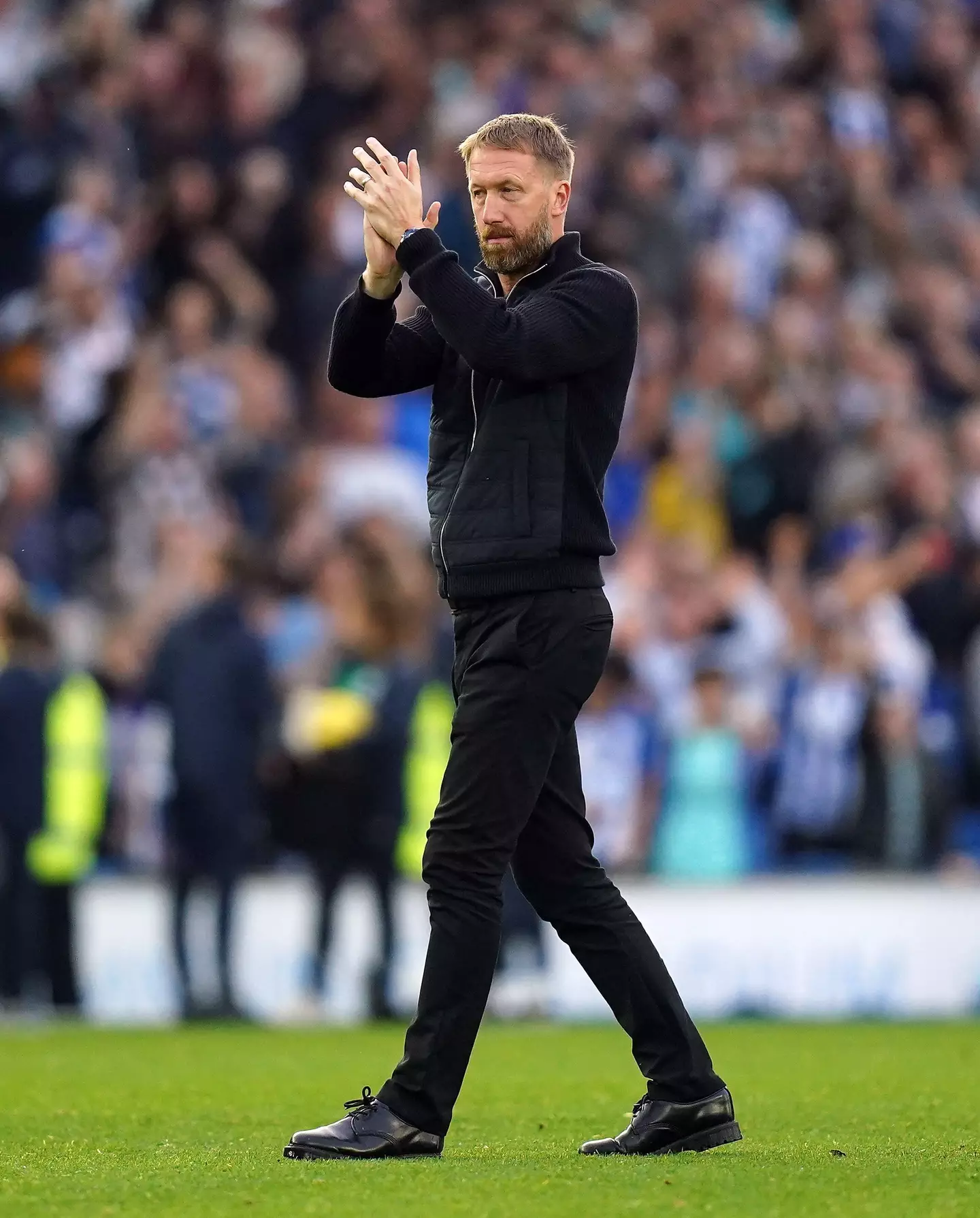 Chelsea manager Graham Potter applauds the fans after the Premier League match at the Amex Stadium, Brighton. (Alamy)