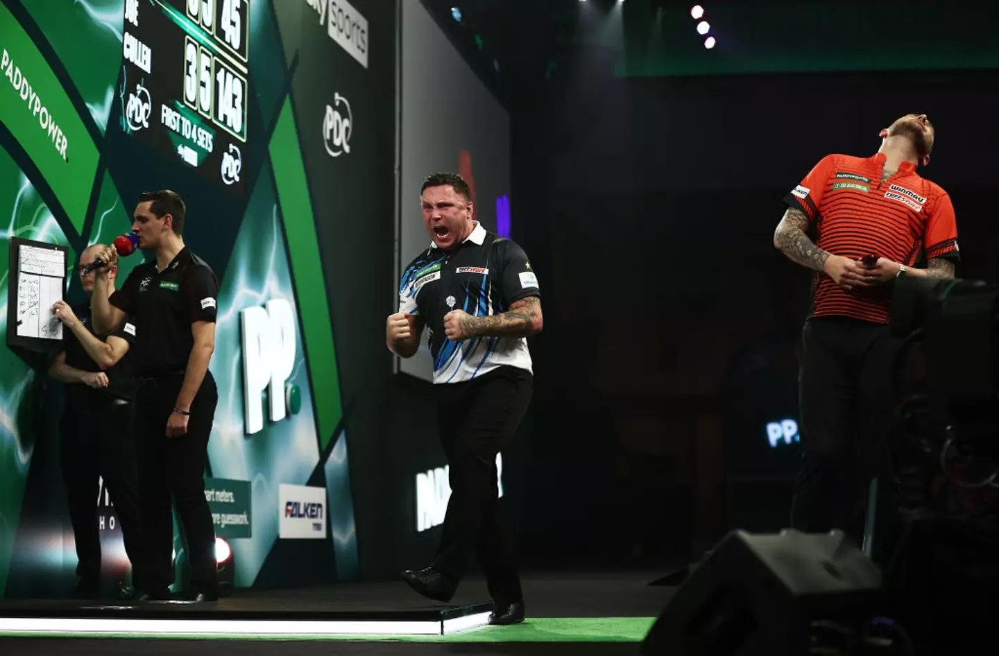 Gerwyn Price celebrates after defeating Joe Cullen in the World Darts Championship (Image: Getty)