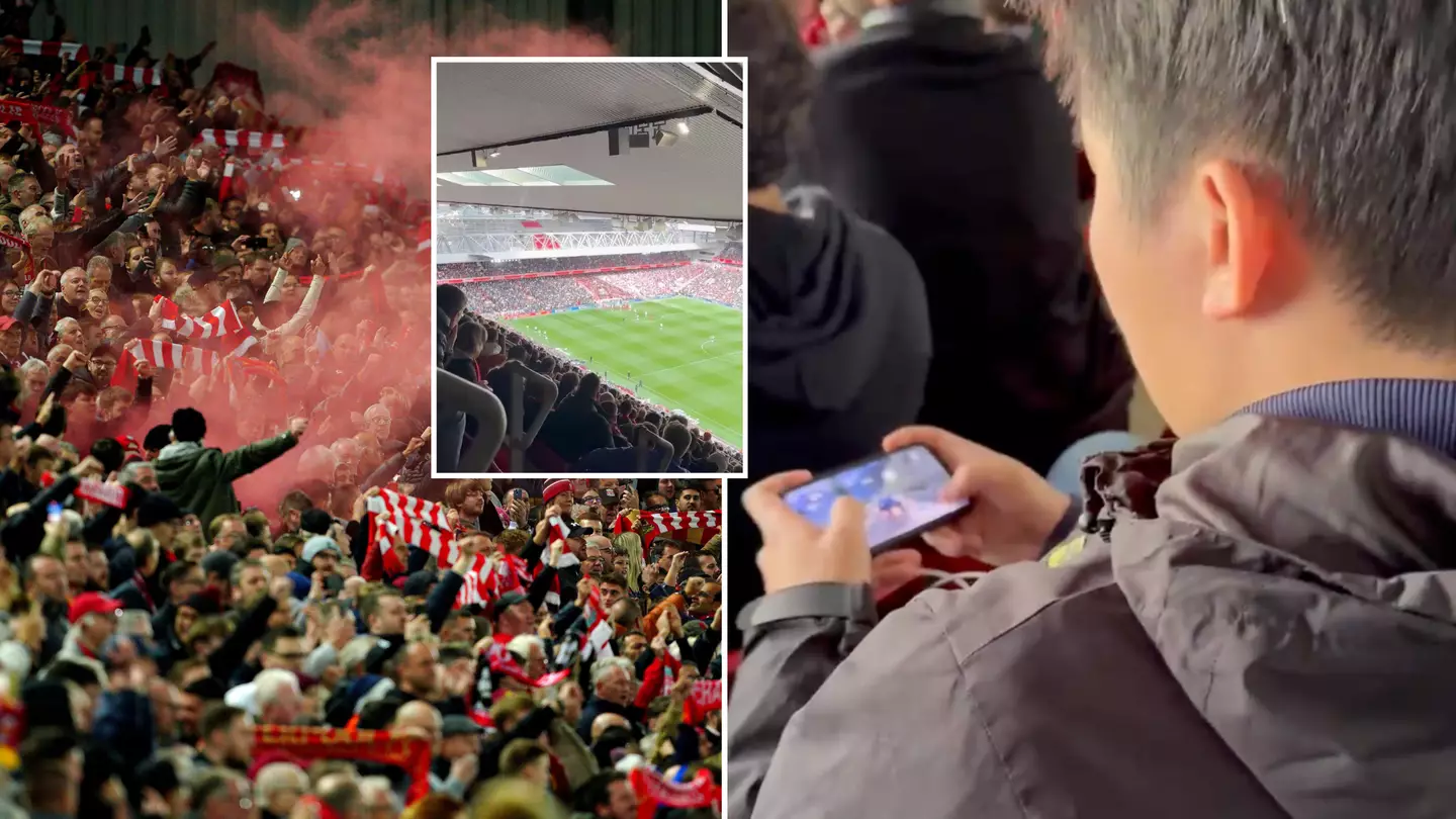Liverpool's famous atmosphere mocked as fan is spotted playing games on his phone