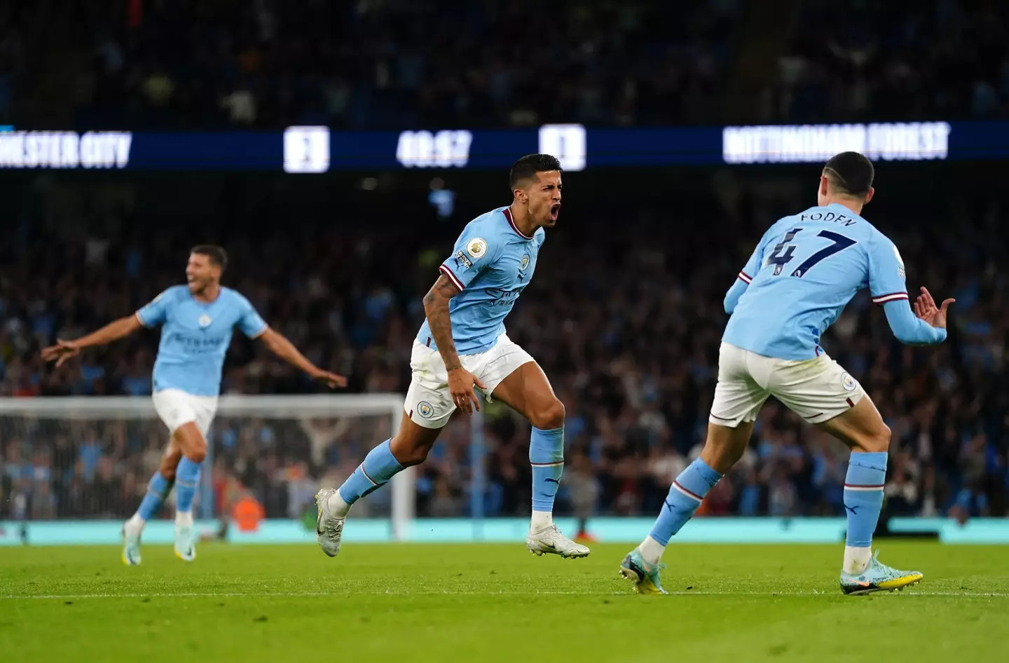 Joao Cancelo celebrates his goal against Nottingham Forest.