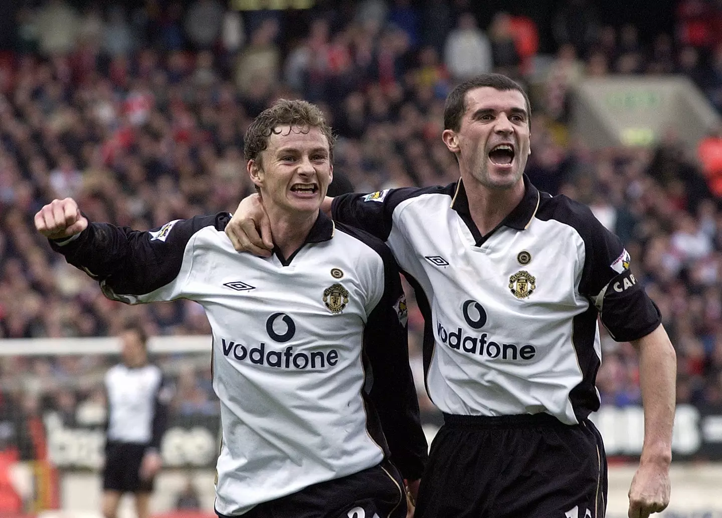 Ole Gunnar Solskjaer and Roy Keane celebrate a goal for Manchester United. Image: Getty