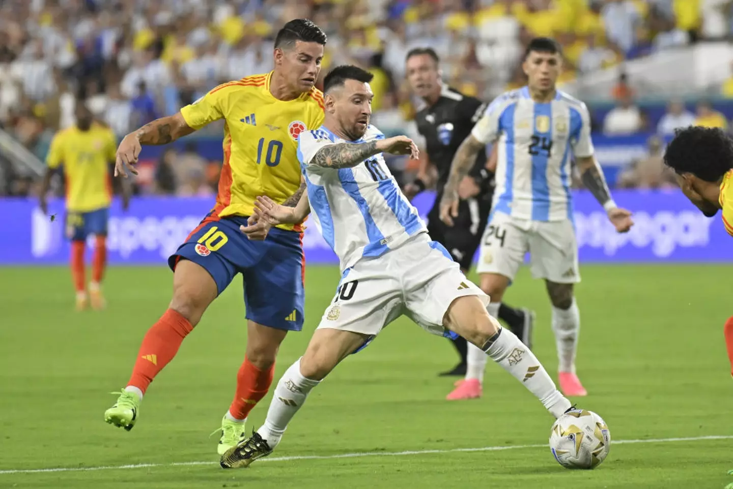 Lionel messi clearly wasn't happy with James Rodriguez during the match. (Image: Getty)