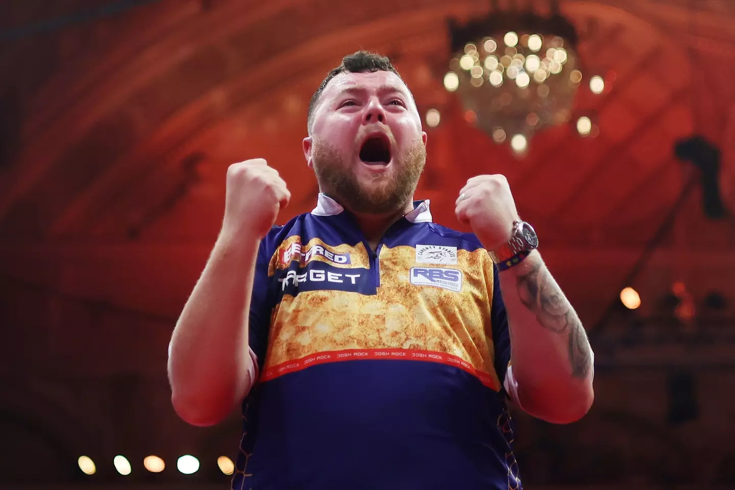 Josh Rock will take on Luke Littler. (Image: Getty)