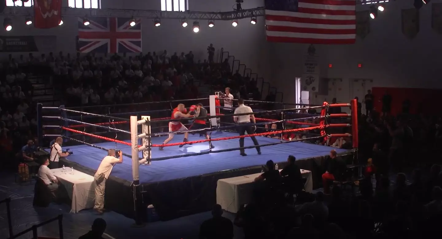 An action shot of the boxing event pitting the USMC against the British marines. Image: YouTube/U.S. Forces Fitness